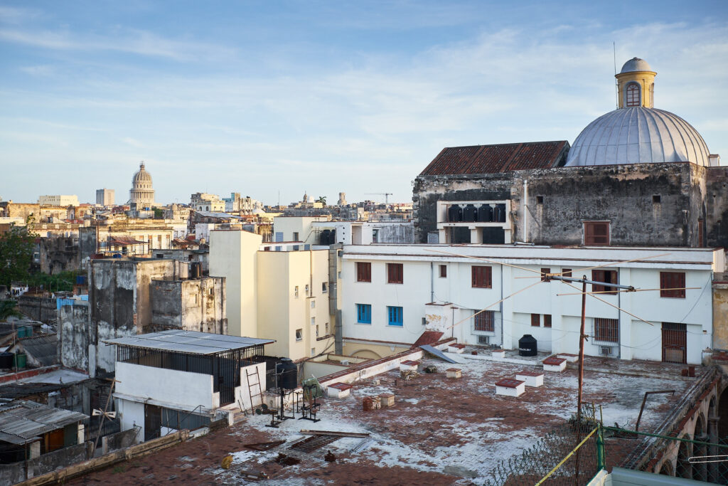 Rooftops of Old Havana. In the foreground: Iglesia y Convento de la Merced 1630, background: National Capital building